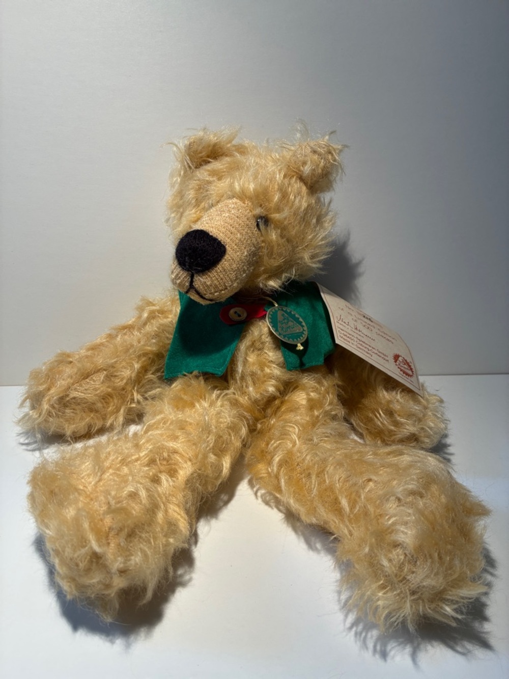Golden Curly Plush Bear Accent with Green Ribbon